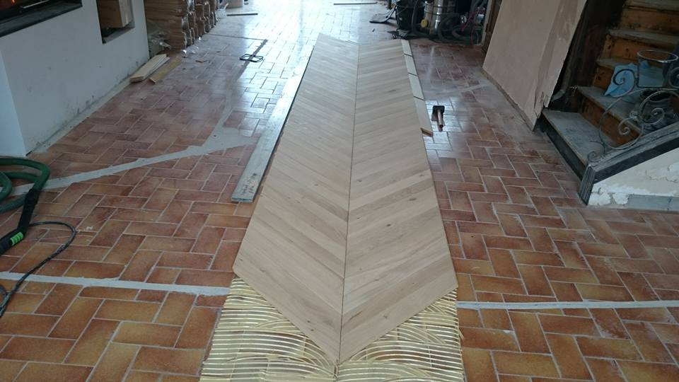 pose parquet collé sur carrelage